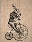 Rabbit On Bicycle(sm) 1 1/4 x 1 1/2" Mounted Rubber Stamp, Steampunk Stamp